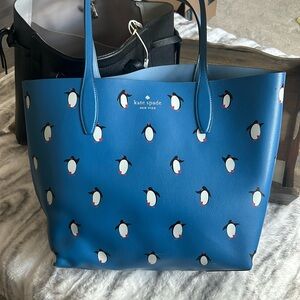 Kate spade reversible penguin purse
